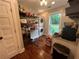 Pantry with custom wood shelving, stackable washer and dryer and views to the exterior at 284 Harris Loop, Dallas, GA 30157