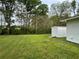 Wide backyard with shed storage and green space at 66 Lakeshore Dr, Bowdon, GA 30108