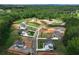 Aerial view of the new construction homes nestled in a lush, green, and expansive community at 133 Prescott Manor Dr, Canton, GA 30115