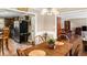 Open dining area with view to the kitchen and living room, perfect for gatherings at 2365 Fontaine Cir, Decatur, GA 30032
