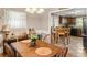 Open dining area that has warm neutral walls and view of the kitchen at 2365 Fontaine Cir, Decatur, GA 30032