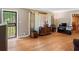 Spacious living room with beautiful hardwood flooring and lots of natural light at 2365 Fontaine Cir, Decatur, GA 30032
