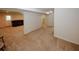 Expansive basement space with neutral carpeting, offering versatile potential for recreation or storage at 2405 Brisbane Dr, Conyers, GA 30013