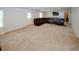 Spacious basement featuring neutral carpeting and ample space for entertainment and relaxation at 2405 Brisbane Dr, Conyers, GA 30013
