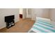 Comfortable bedroom with plush carpeting and an en-suite bath at 2405 Brisbane Dr, Conyers, GA 30013