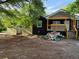 View of the exterior, with front yard and new fence being built around the property at 388 Sargent Se Dr, Atlanta, GA 30315