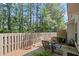 View of the backyard with a privacy fence and outdoor seating area at 441 Mountain View Ln, Woodstock, GA 30188