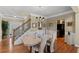 Elegant dining room area with hardwood floors and stairs at 441 Mountain View Ln, Woodstock, GA 30188