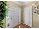 Bright entryway featuring hardwood floors and a view into the main living space at 441 Mountain View Ln, Woodstock, GA 30188