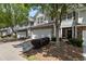 A well-maintained townhome complex featuring garages and landscaped grounds at 441 Mountain View Ln, Woodstock, GA 30188