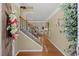 The foyer offers a staircase and hardwood floors at 441 Mountain View Ln, Woodstock, GA 30188