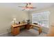 Home office featuring a ceiling fan, natural light and a functional desk space at 441 Mountain View Ln, Woodstock, GA 30188
