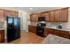 Well-equipped kitchen boasts stainless appliances, granite countertops, and ample cabinet space at 441 Mountain View Ln, Woodstock, GA 30188