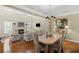 Bright and open living room with a fireplace and hardwood floors at 441 Mountain View Ln, Woodstock, GA 30188