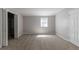 Bright bedroom featuring neutral paint and carpet at 1045 Summer Hill Nw Ct, Acworth, GA 30102