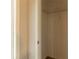 Bright walk-in closet with ample hanging space and storage shelf at 1045 Summer Hill Nw Ct, Acworth, GA 30102