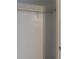 Walk-in closet with ample hanging space and storage shelf at 1045 Summer Hill Nw Ct, Acworth, GA 30102