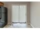 Kitchen with sliding glass door offering natural light at 1045 Summer Hill Nw Ct, Acworth, GA 30102