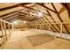 Spacious unfinished attic with exposed beams and insulation at 120 Warren Ne St, Atlanta, GA 30317