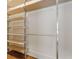Custom closet shelving system in a well-organized walk-in closet at 120 Warren Ne St, Atlanta, GA 30317