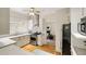 Contemporary kitchen with granite countertops, stainless appliances, and a view to the living room at 120 Warren Ne St, Atlanta, GA 30317