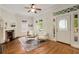Stylish living room with decorative fireplace and beautiful hardwood floors at 120 Warren Ne St, Atlanta, GA 30317