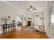 Bright living room featuring fireplace, hardwood floors, and ample natural light at 120 Warren Ne St, Atlanta, GA 30317