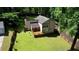Aerial view of the property showcasing the backyard, deck, and surrounding landscape at 2926 Swarthmore Dr, Lawrenceville, GA 30044