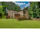 Spacious backyard with a wooden deck perfect for entertaining and outdoor enjoyment at 2926 Swarthmore Dr, Lawrenceville, GA 30044