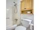 Bathroom featuring a shower-tub combination, light wood cabinet, and standard toilet at 2926 Swarthmore Dr, Lawrenceville, GA 30044