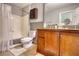 Bathroom featuring a shower-tub, toilet, vanity and tile floors at 2926 Swarthmore Dr, Lawrenceville, GA 30044