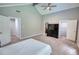 Bedroom featuring vaulted ceilings, ensuite bathroom and walk-in closet at 2926 Swarthmore Dr, Lawrenceville, GA 30044