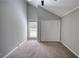 Bedroom showcasing neutral walls, a window, and a large closet for ample storage at 2926 Swarthmore Dr, Lawrenceville, GA 30044