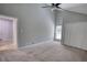A bedroom with vaulted ceiling, carpet flooring, closet, and a ceiling fan at 2926 Swarthmore Dr, Lawrenceville, GA 30044
