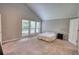 Bedroom featuring vaulted ceilings and large windows at 2926 Swarthmore Dr, Lawrenceville, GA 30044