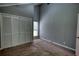 Spacious bedroom featuring neutral walls, a window, and a large closet for ample storage at 2926 Swarthmore Dr, Lawrenceville, GA 30044