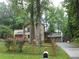Attractive home with well-manicured front lawn and a convenient two-car garage at 2926 Swarthmore Dr, Lawrenceville, GA 30044