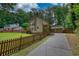 Charming two-story home with a well-maintained lawn, and a two-car garage at 2926 Swarthmore Dr, Lawrenceville, GA 30044