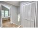 Upstairs hallway with closet and carpeted floor, leading to the bedrooms at 2926 Swarthmore Dr, Lawrenceville, GA 30044