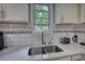 Clean white countertop with subway tile backsplash at 2926 Swarthmore Dr, Lawrenceville, GA 30044