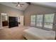 Spacious main bedroom featuring vaulted ceilings and large windows at 2926 Swarthmore Dr, Lawrenceville, GA 30044