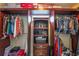 Walk-in closet with custom shelving and plenty of storage space for clothing and accessories at 3637 Sweet Ashley Ln, Loganville, GA 30052