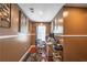 A well-lit home office featuring hardwood floors, contemporary decor, and a functional workspace at 3637 Sweet Ashley Ln, Loganville, GA 30052