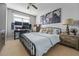 Bedroom featuring a bed, ceiling fan, and a large window at 508 Vinings Forest Se Ct, Smyrna, GA 30080