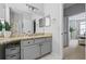 The bathroom boasts granite counters, a large mirror, and contemporary lighting at 508 Vinings Forest Se Ct, Smyrna, GA 30080