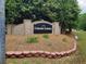 Entrance to Lincoln Estates community, showcasing a brick sign and landscaped surroundings at 70 Paladin Dr, Covington, GA 30016