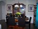 Formal dining room featuring a wooden china cabinet and elegant decor at 70 Paladin Dr, Covington, GA 30016