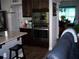 Gourmet kitchen boasts stainless steel appliances and granite countertops at 70 Paladin Dr, Covington, GA 30016
