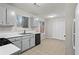 Bright kitchen with ample counter space, modern appliances, and a spacious pantry at 1056 Park West Ct, Stone Mountain, GA 30088
