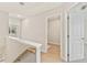 Upstairs hallway with stairs and closet at 1991 Deco Dr, Kennesaw, GA 30144